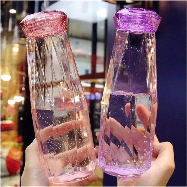 Diamond-Shaped Glass Water Bottles Featuring Geometric Design
