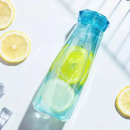 Diamond-Shaped Glass Water Bottles Featuring Geometric Design