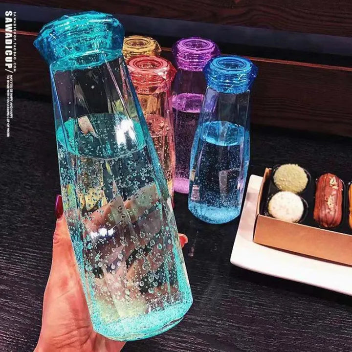 Diamond-Shaped Glass Water Bottles Featuring Geometric Design