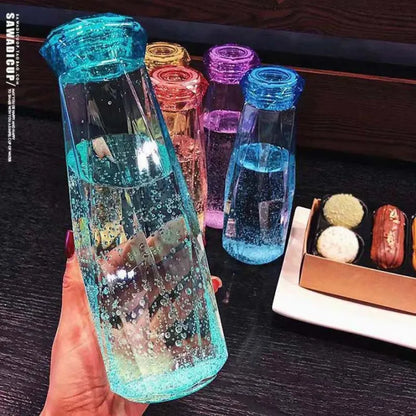Diamond-Shaped Glass Water Bottles Featuring Geometric Design